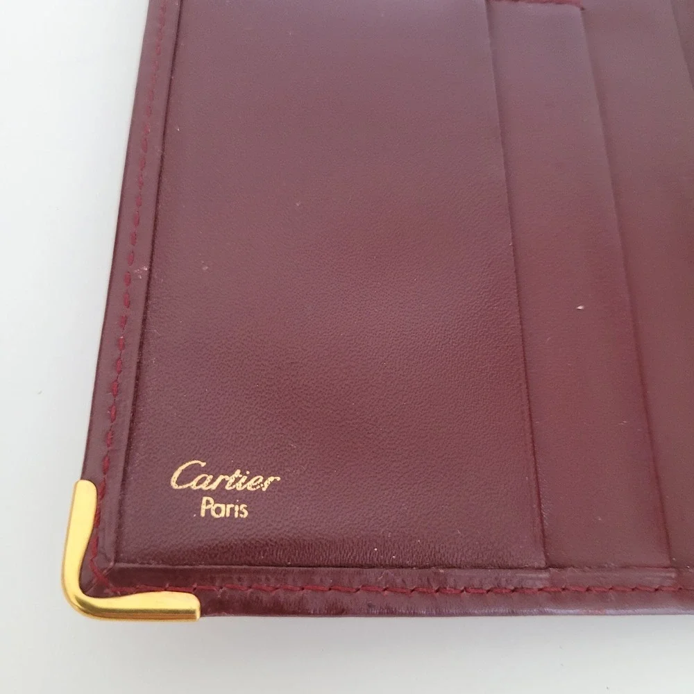 Cartier Must de Cartier Burgundy Leather Long Bifold Wallet Gold Corners Italy